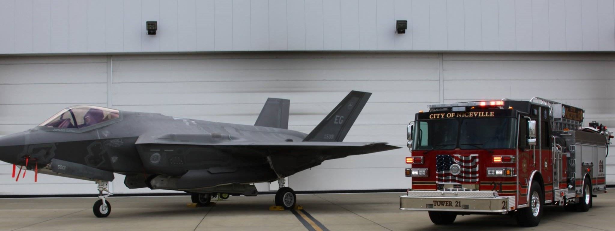 F35 fighter jet next to Tower 21